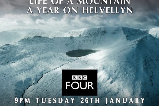 an aerial shot of a snow-clad Helvellyn in the Lake District. with the BBC Four icon